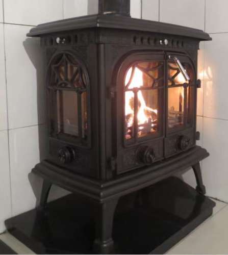 Cast iron stove ,American forest paint, German Schott glass,fireplace.