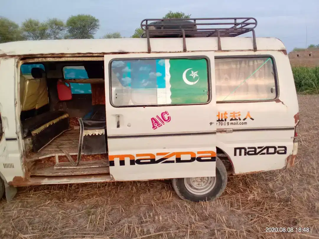 White coloure toyota mazda van 1993 model