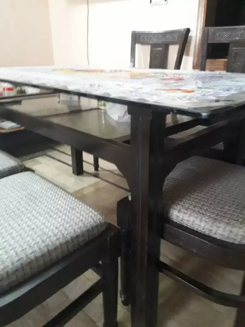 Dinning table with chiars .