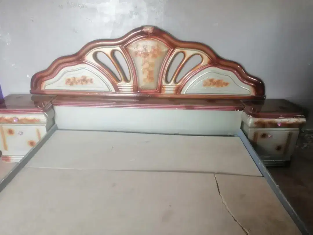 Almost new bed and dressing table and 2 side tables. Slightly used.