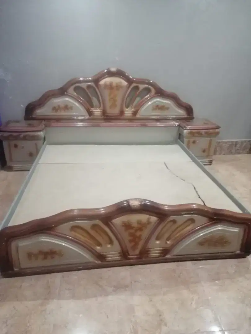 Almost new bed and dressing table and 2 side tables. Slightly used.