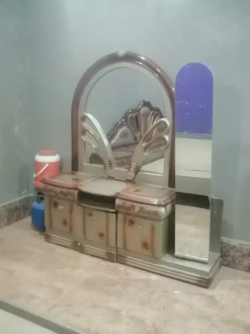 Almost new bed and dressing table and 2 side tables. Slightly used.