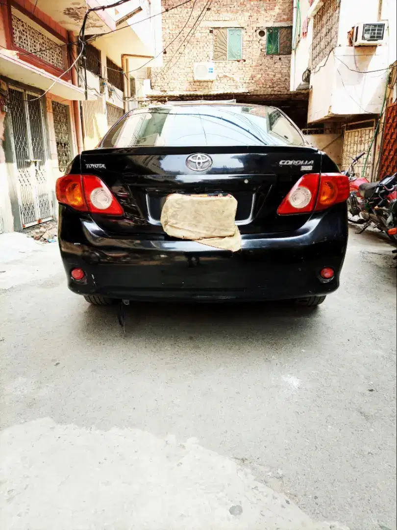 Black Toyota corolla xli vvti for sale in lahore