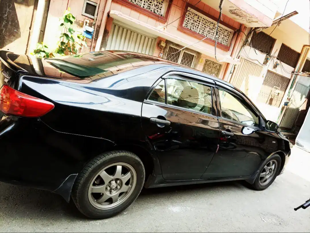 Black Toyota corolla xli vvti for sale in lahore