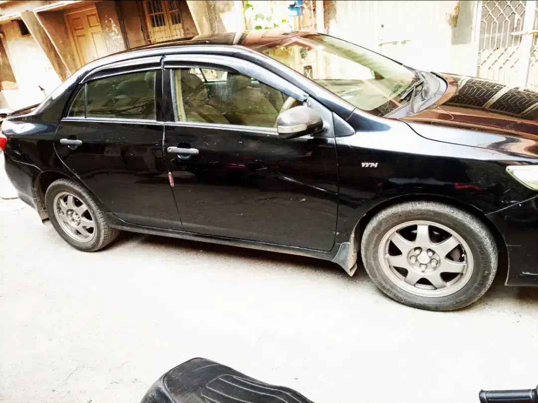 Black Toyota corolla xli vvti for sale in lahore