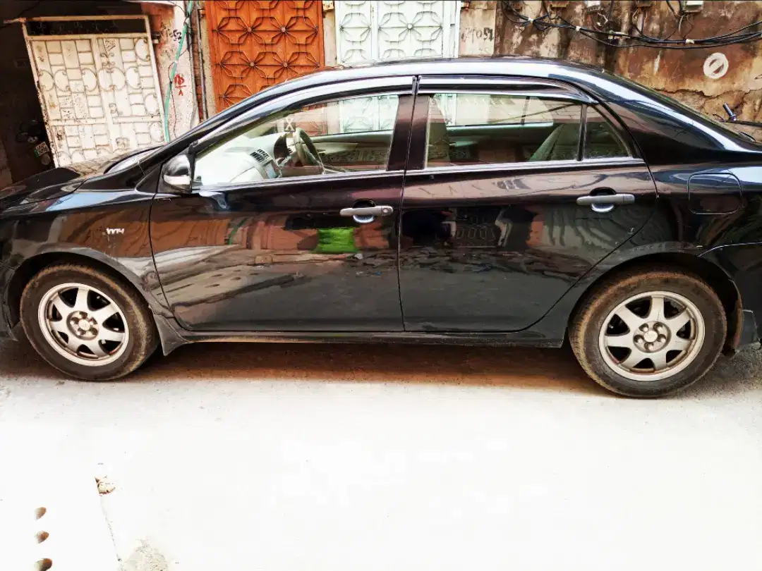 Black Toyota corolla xli vvti for sale in lahore