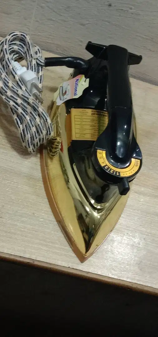 Higher quality national golden iron with black handle For sale