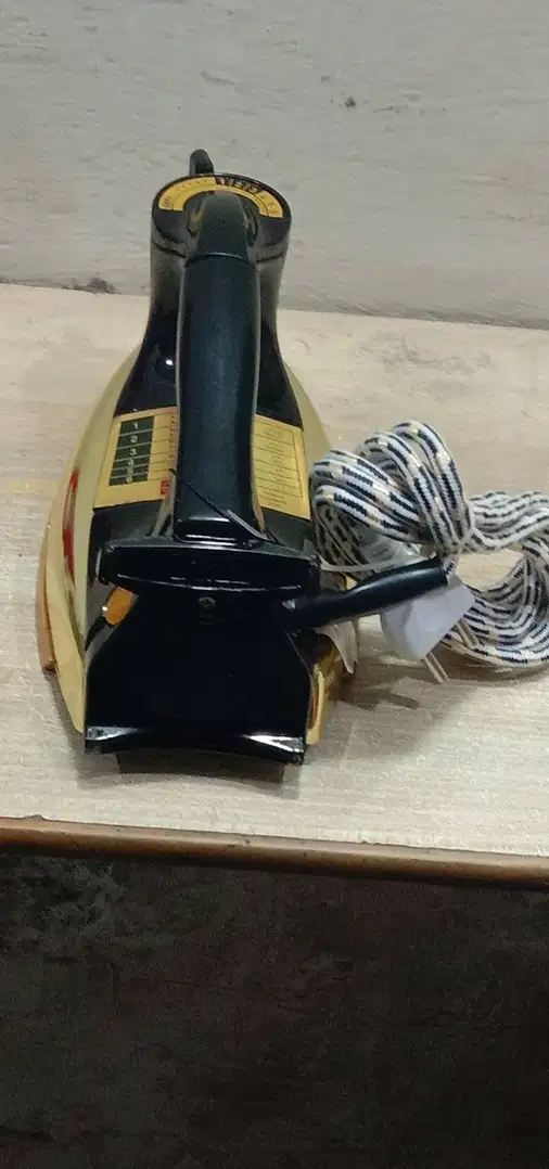 Higher quality national golden iron with black handle For sale