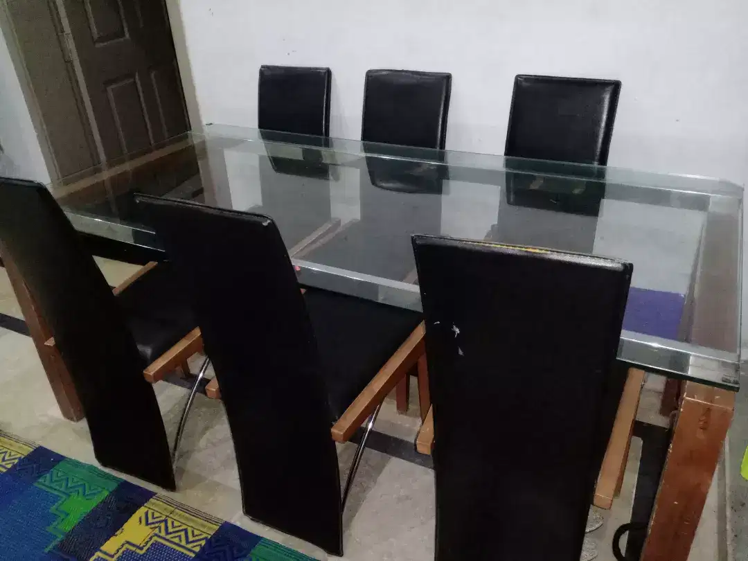 Glass top Dining table Available for sale