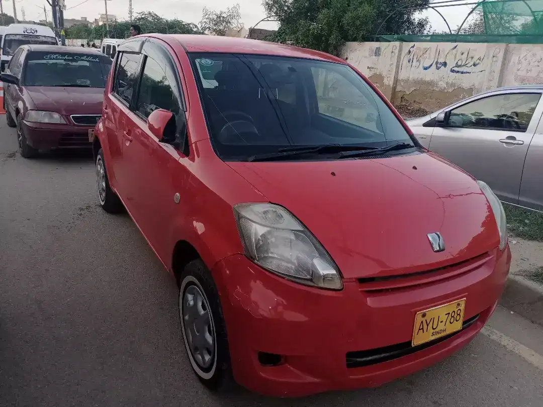 Car Toyota Passo 2007 Model in Red Color Available for Sale in Karchi