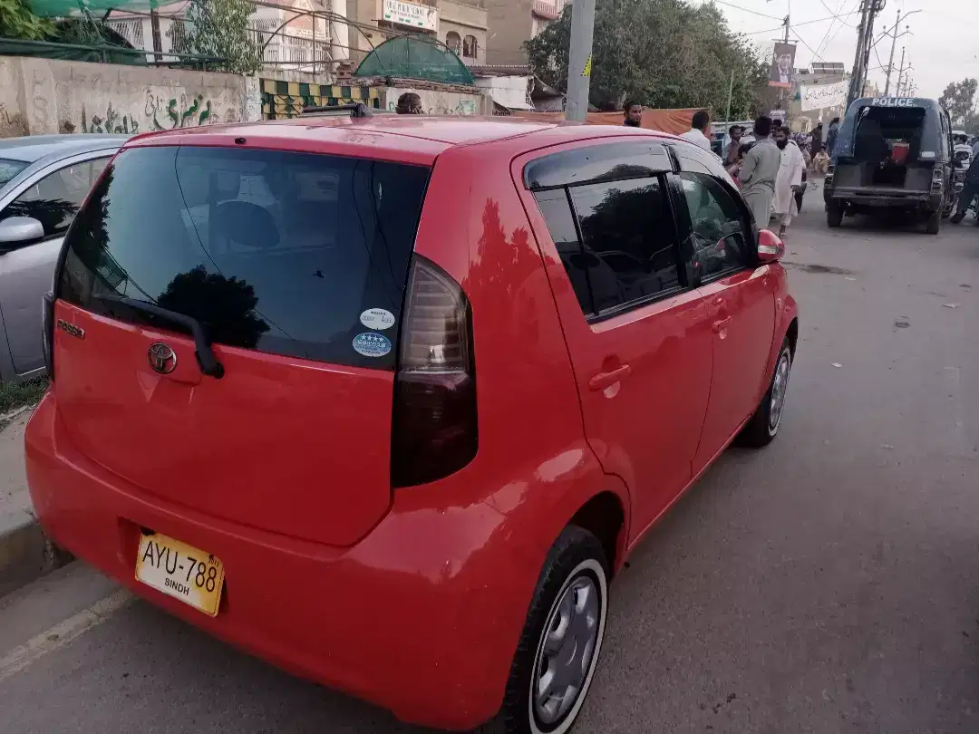 Car Toyota Passo 2007 Model in Red Color Available for Sale in Karchi
