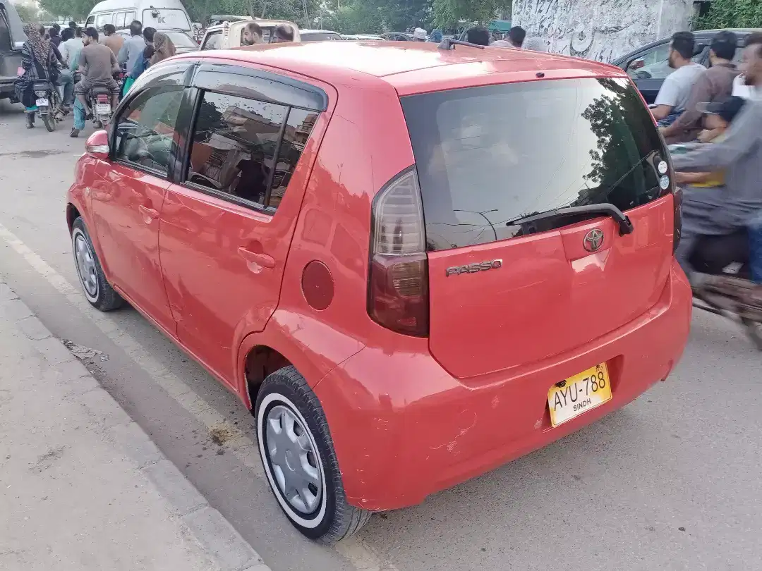 Car Toyota Passo 2007 Model in Red Color Available for Sale in Karchi
