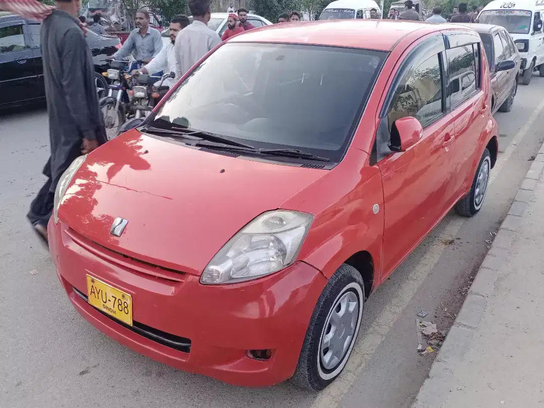 Car Toyota Passo 2007 Model in Red Color Available for Sale in Karchi