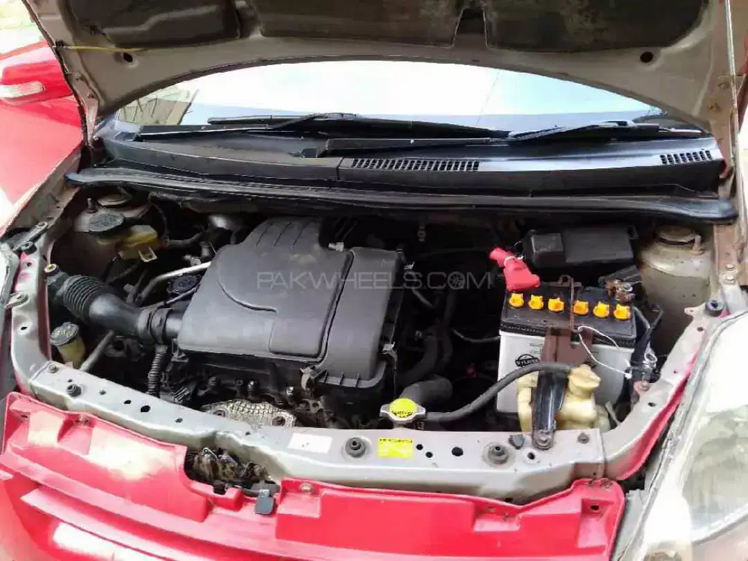 Car Toyota Passo 2007 Model in Red Color Available for Sale in Karchi