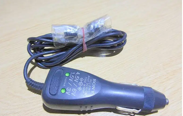 Car charger for dvd players and digital cameras.