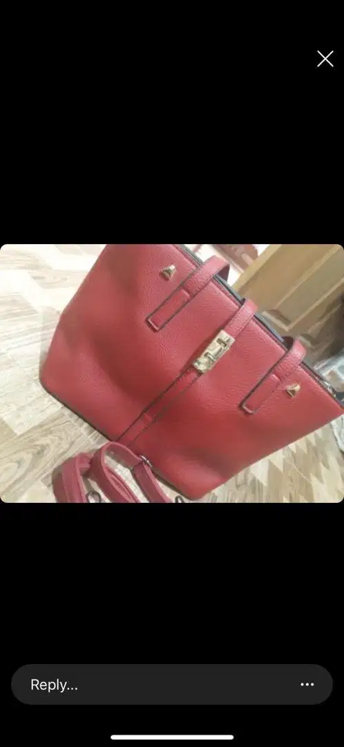 Red hand bag available for sale