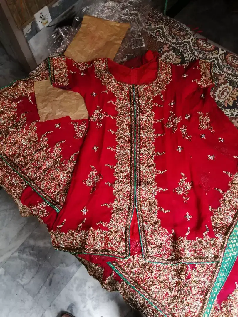 Red Long lengha Available for Sale in Lahore