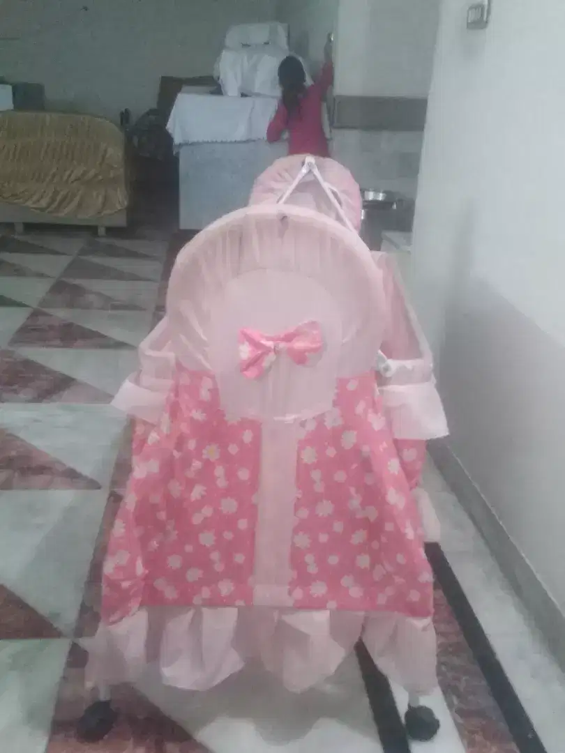 Pram in pink color Available for Faisalabad