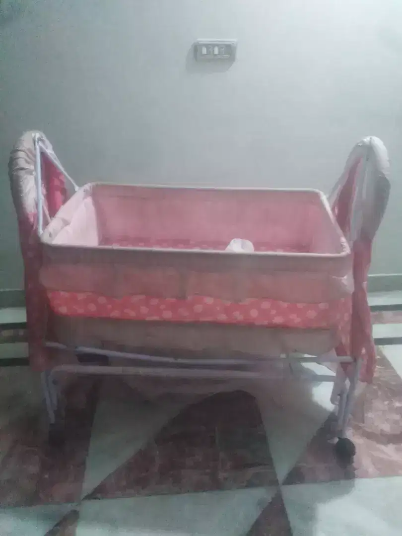 Pram in pink color Available for Faisalabad