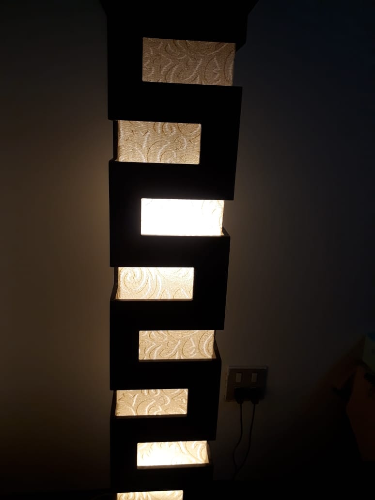 Standing wooden lamp available here