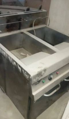 ovens, fryer, hotplate, hood, tables ,chairs