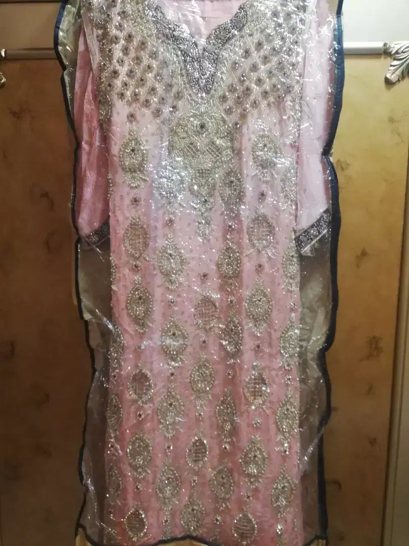 Embroidered dress available for sale