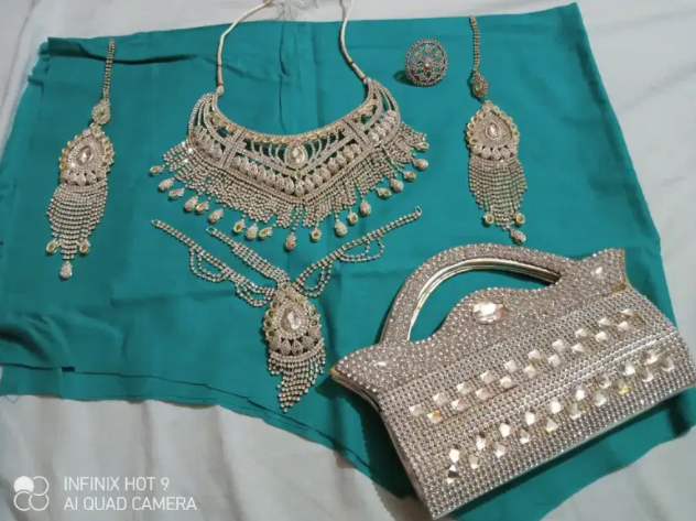 Artificial jewellery complete set in white color Available for Sale in Mirpur