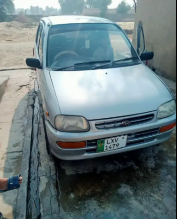 Daihatsu Cuore Car in Silver color Available for Sale in Khanewal