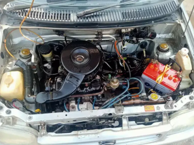 Daihatsu Cuore Car in Silver color Available for Sale in Khanewal