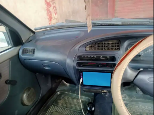 Daihatsu Cuore Car in Silver color Available for Sale in Khanewal