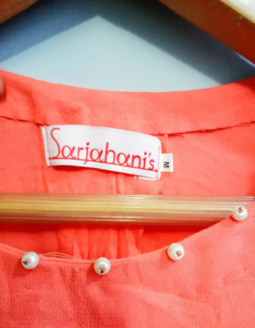 Branded top Available for sale