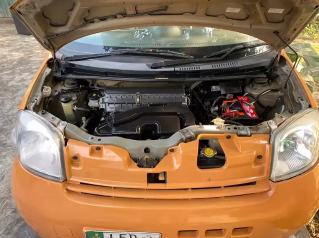 Daihatsu ESSE 2011 Model in Orange Color Available for Sale in Lahore