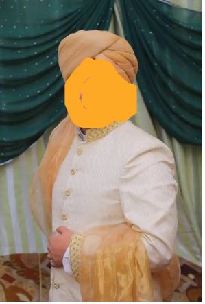 Off white color embroidered Sherwani