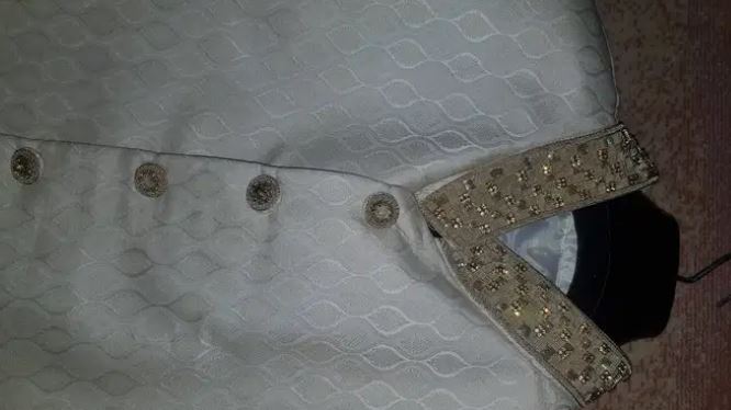 Off white color embroidered Sherwani