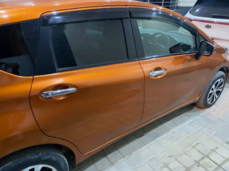 Nissan note 2017 Color golden brown Available for sale in Islamabad