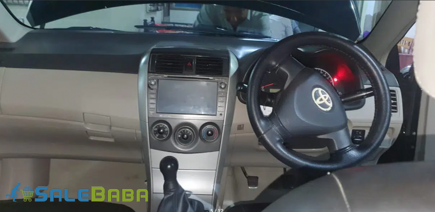 Toyota Corolla GLI 2013 in black color available for sale in Shikarpur